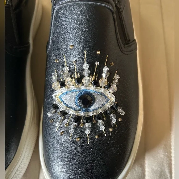 Kurt Geiger Kids Black Slip-On Shoes with Eye Design - Picture 6 of 7